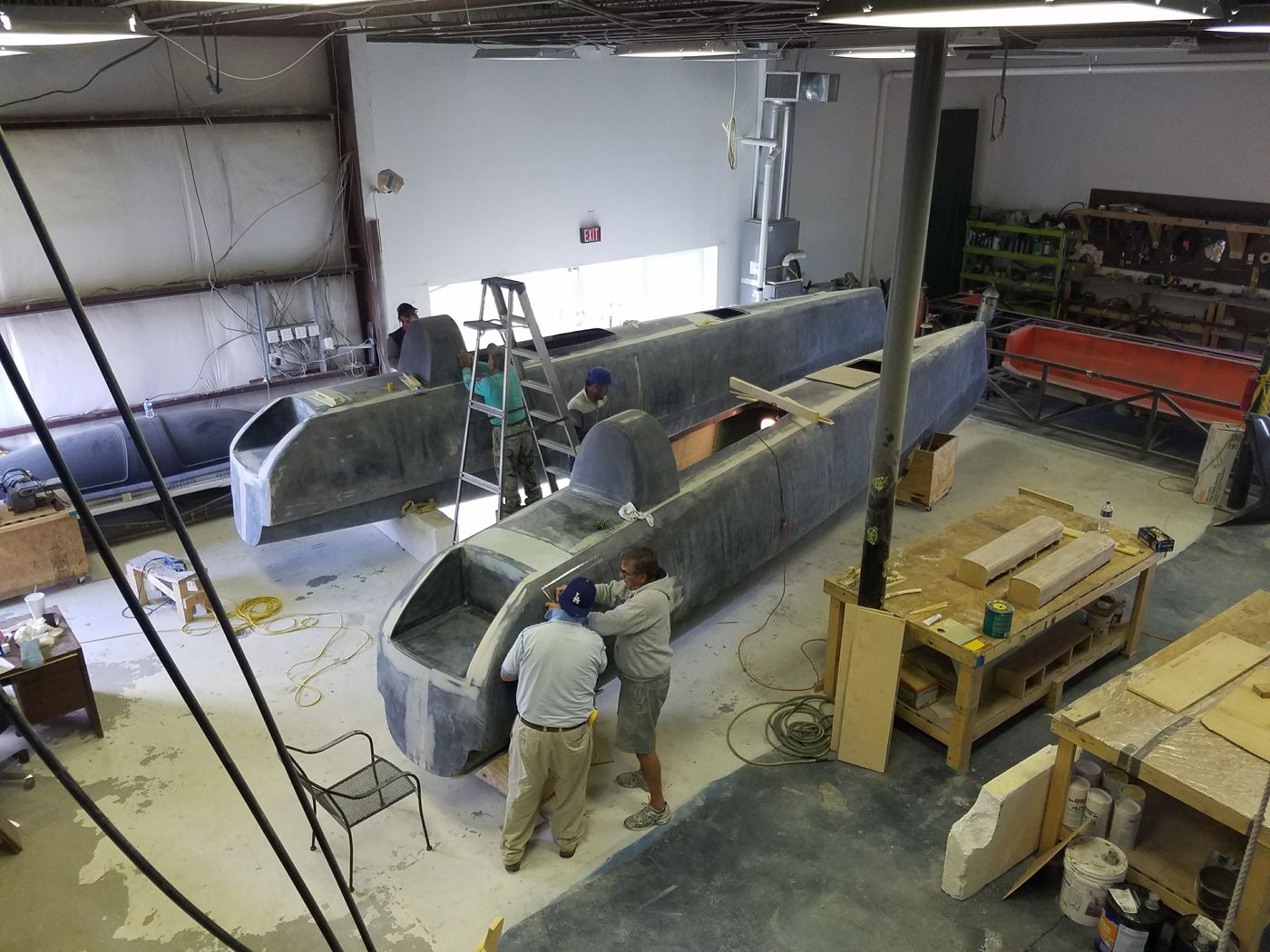 Stiletto X hulls out of the molds and in fairing, November 2016.